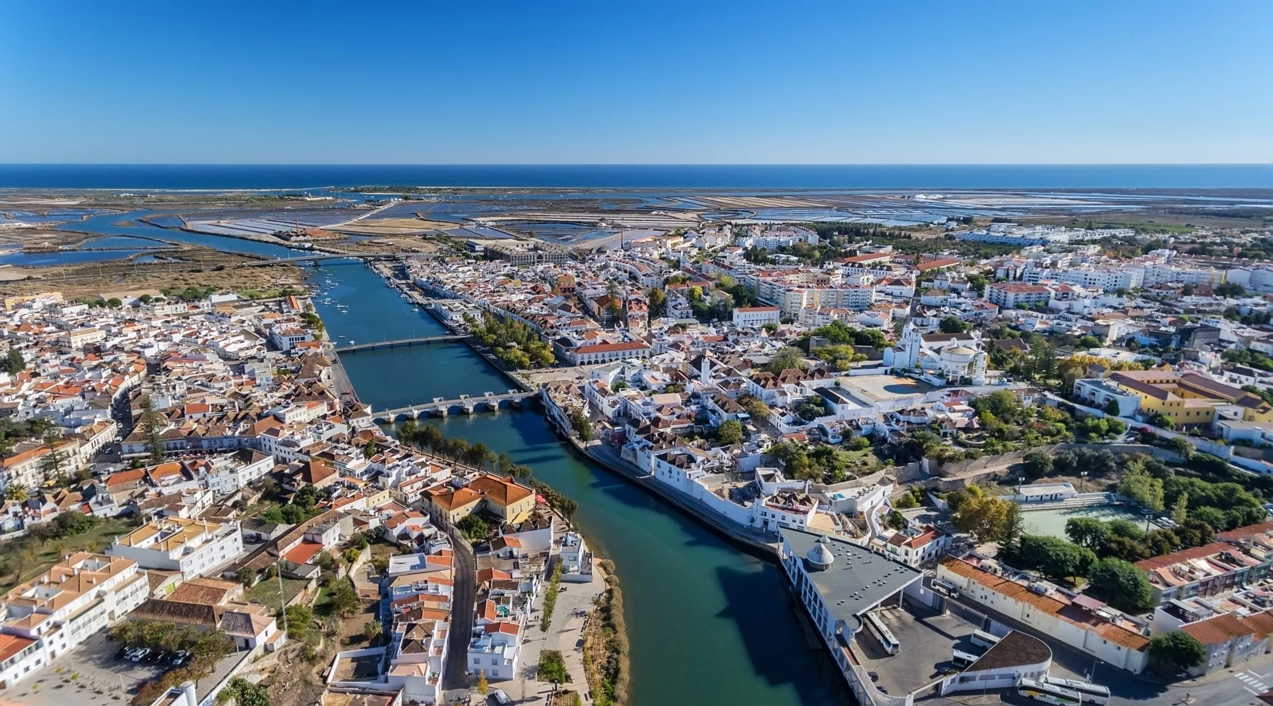 Aerial. The Gilao River and bridges in city of Tavira.