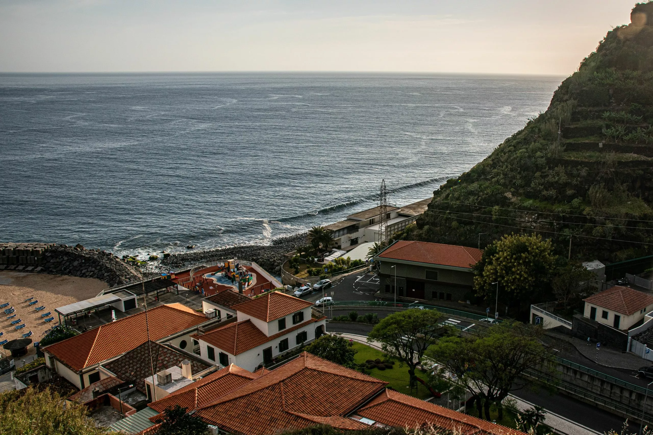 Aerial view of a bay with houses in Estreito da Calheta