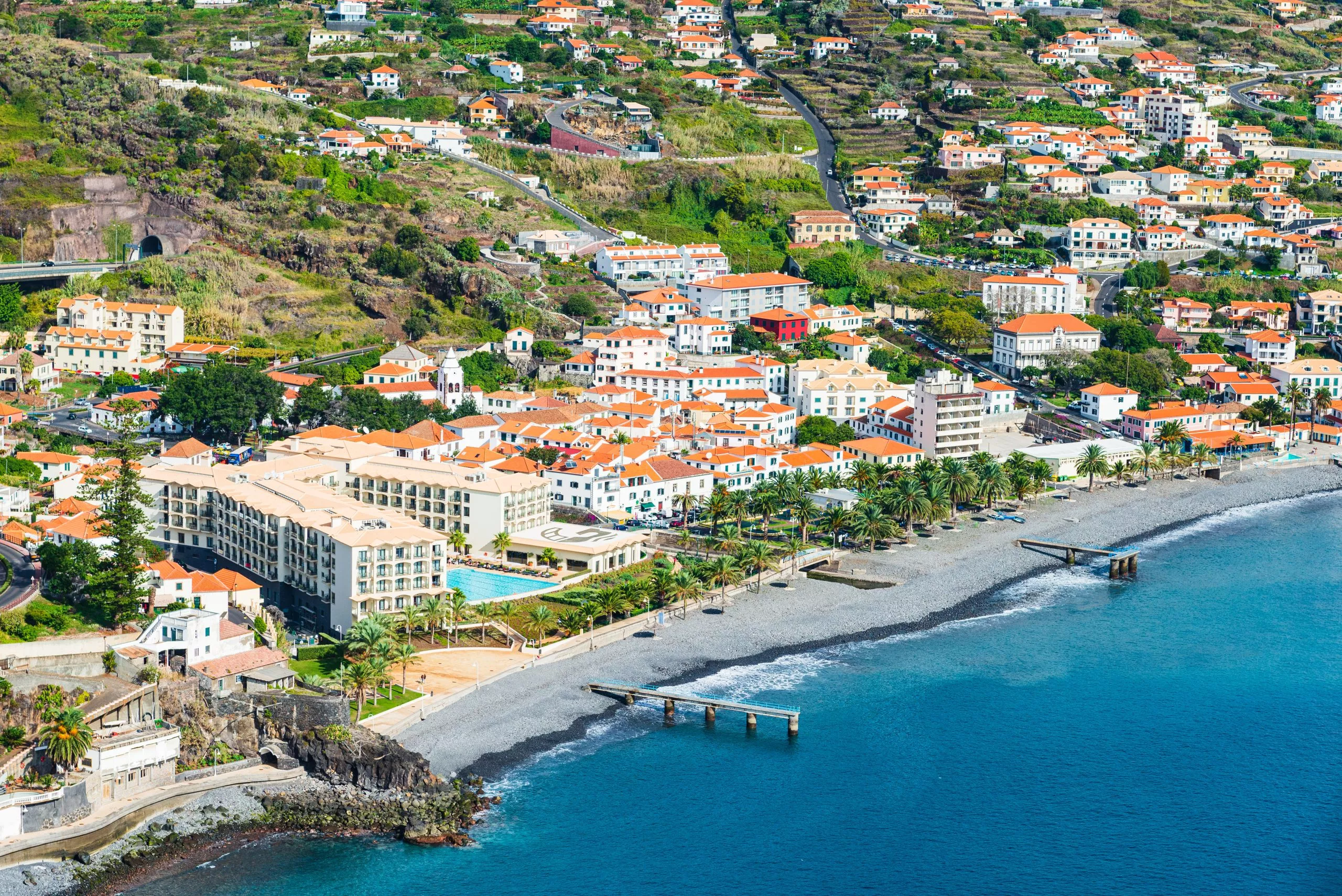 Sprawling city at the water's edge. Santa Cruz, Madeira
